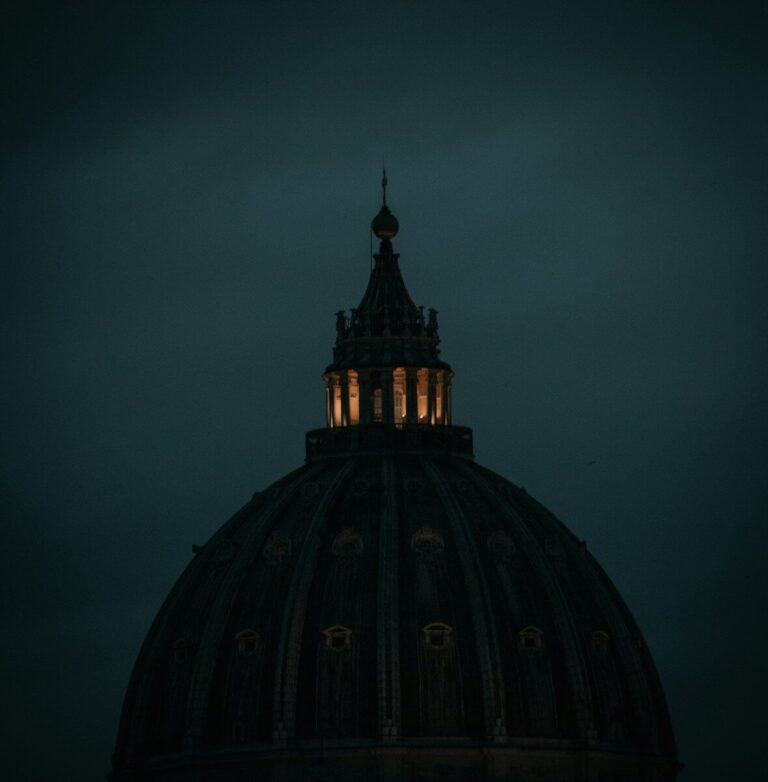 the dome of a building lit up at night